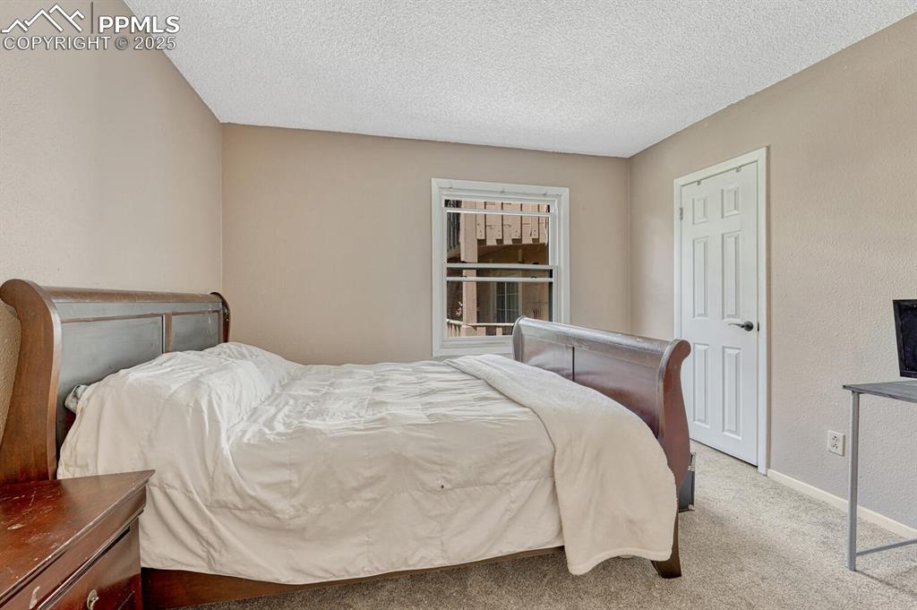 Image 21 of 48: Bedroom 2 on main with walk in closet