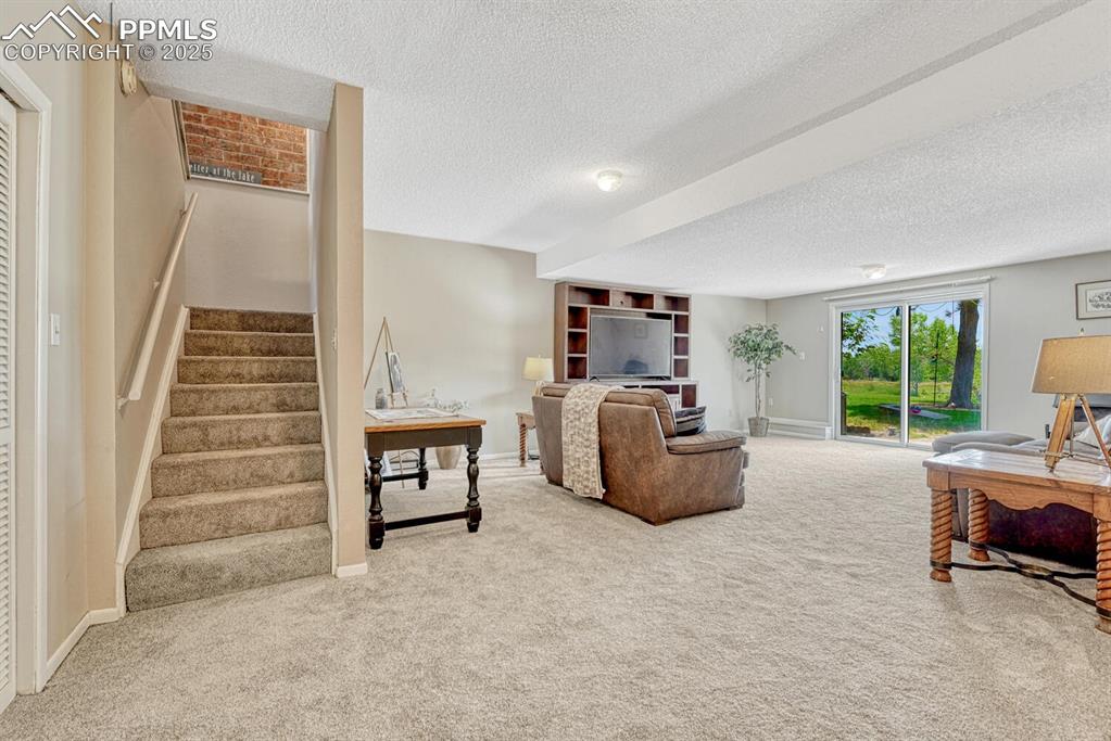 Image 24 of 48: Basement living room