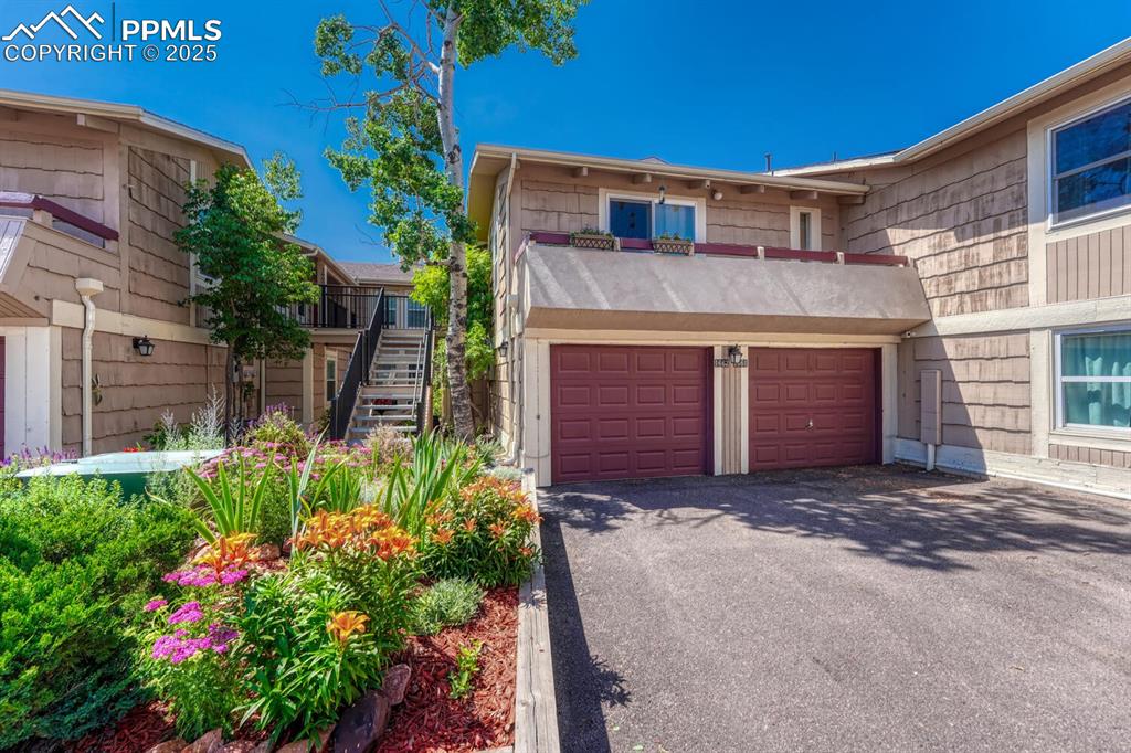 Image 3 of 48: Garage for this unit is on the right