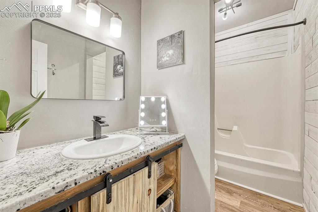 Image 32 of 48: Full bathroom in basement