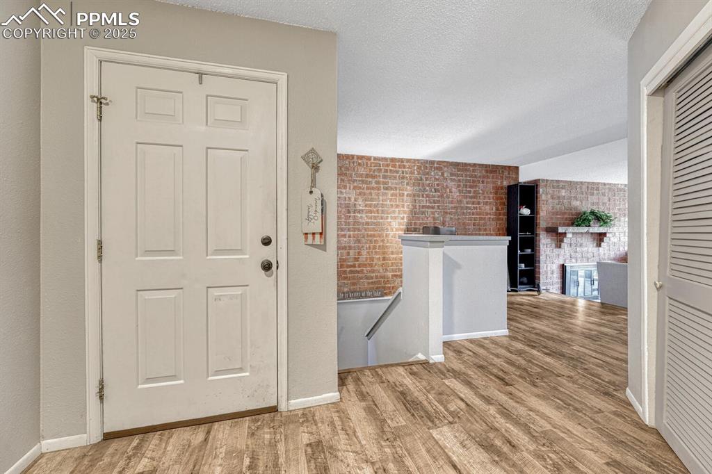 Image 4 of 48: Entry into home with LVP flooring