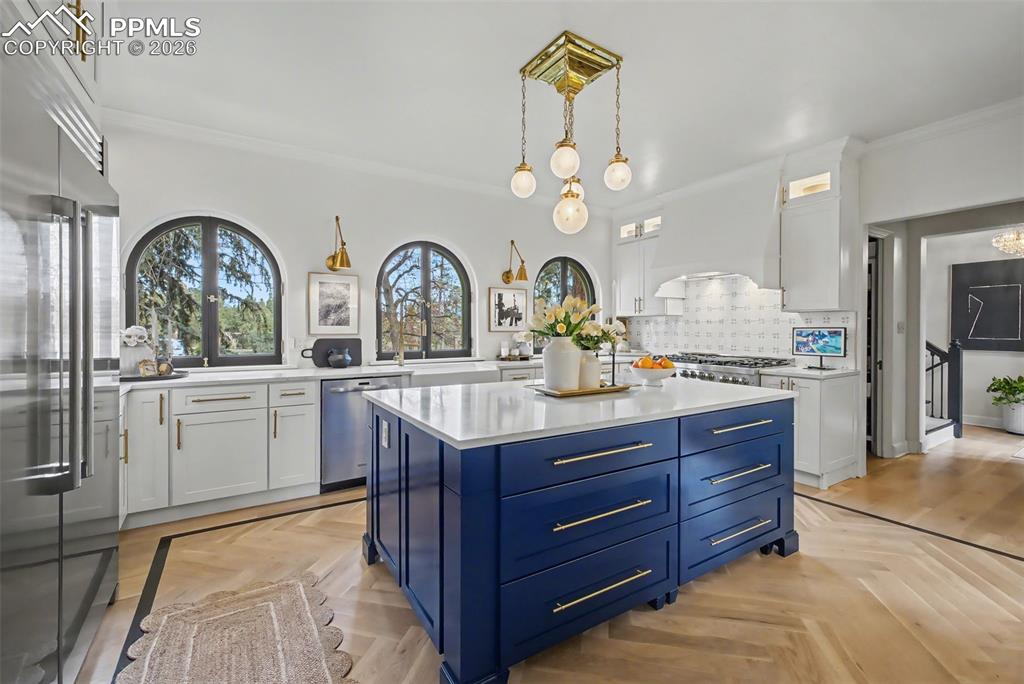 Image 13 of 49: Notice the new herringbone flooring