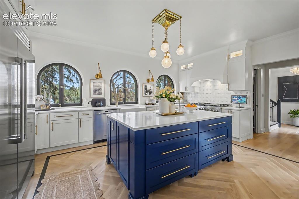 Image 14 of 50: Notice the new herringbone flooring