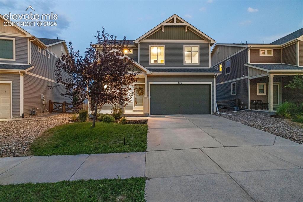 Caption: This lovely two-story home in Banning Lewis Ranch backs to an open green belt owned by the BLR metro