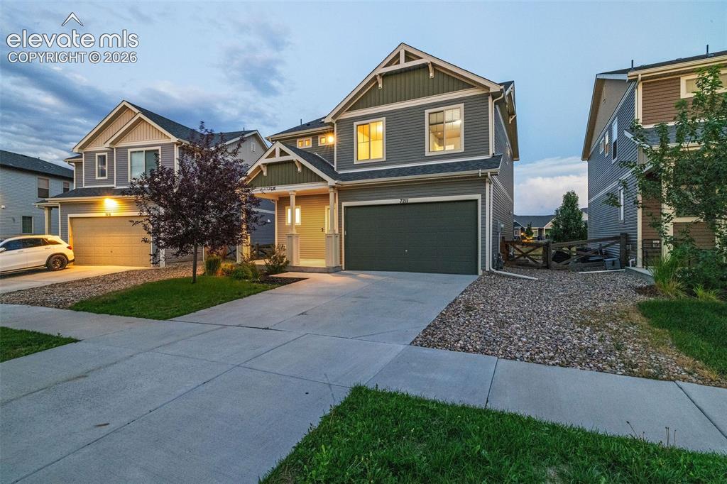Image 2 of 48: So pretty! This home has beautiful curb appeal, and looks like it could hav