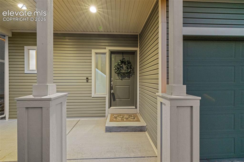 Image 3 of 48: This large, covered front porch welcomes you home and greets guests. There 
