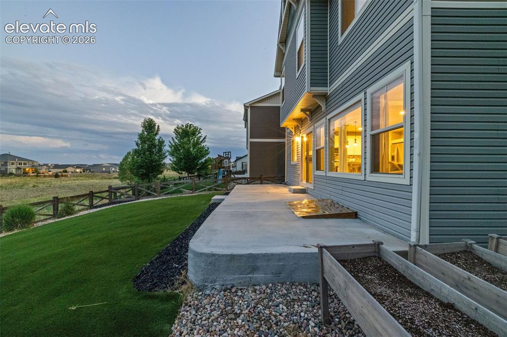 Image 37 of 48: The concrete patio is great for backyard barbecues or sitting out and enjoy