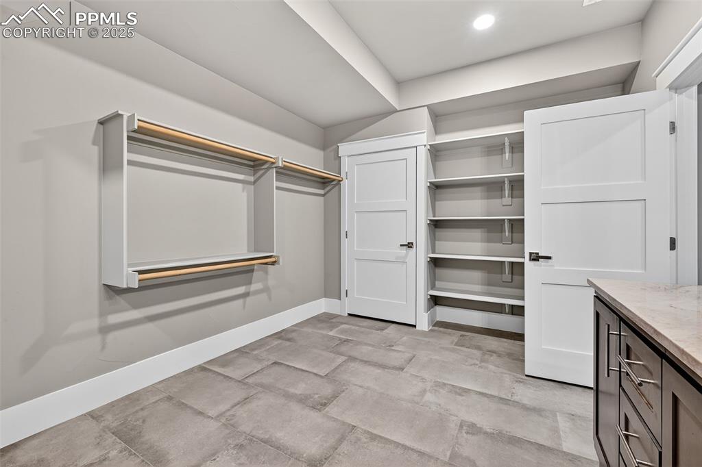 Image 43 of 50: View of walk in closet