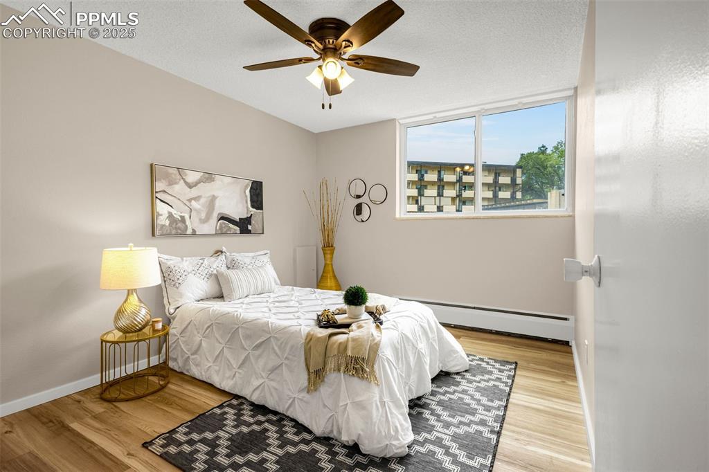 Image 9 of 14: Bedroom 2 with new ceiling fan and HUGE closets also!