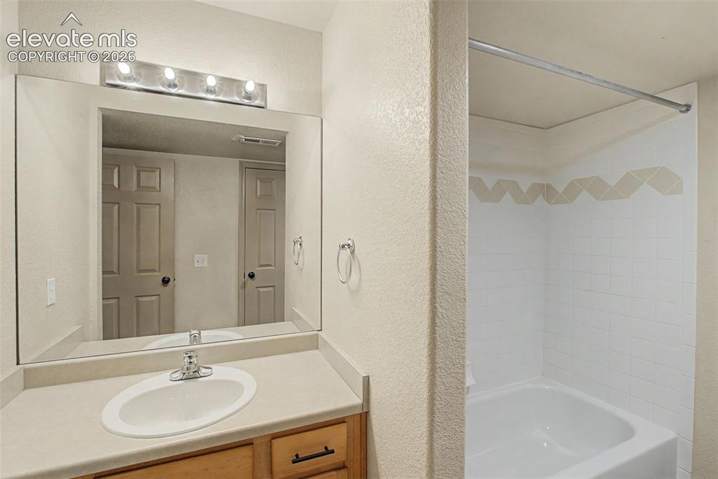 Image 25 of 40: second full basement bathroom