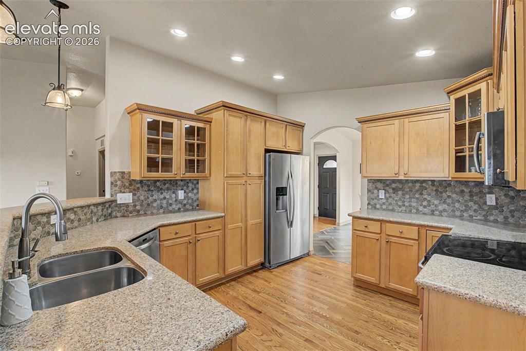 Image 8 of 40: finished walkout basement, full kitchen, 3 bedrooms, 2 full bathrooms, laun