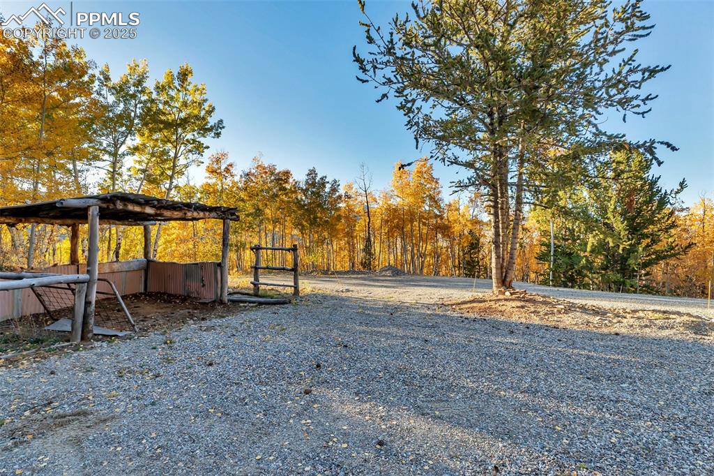 Image 24 of 50: Level area, ideal for building a garage