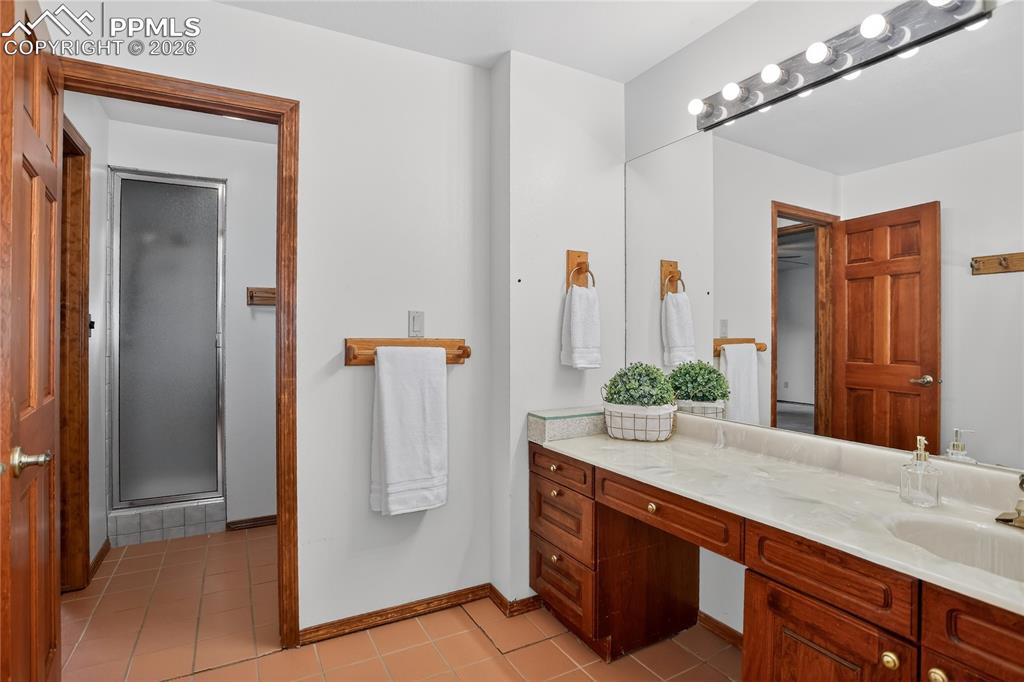 Image 22 of 30: Guest bath - lower level