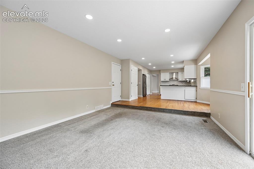 Image 13 of 50: Family Room looking into the Kitchen