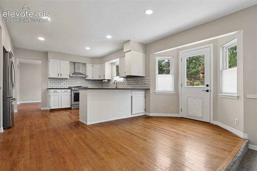Image 14 of 50: Kitchen with freshly painted cabinets