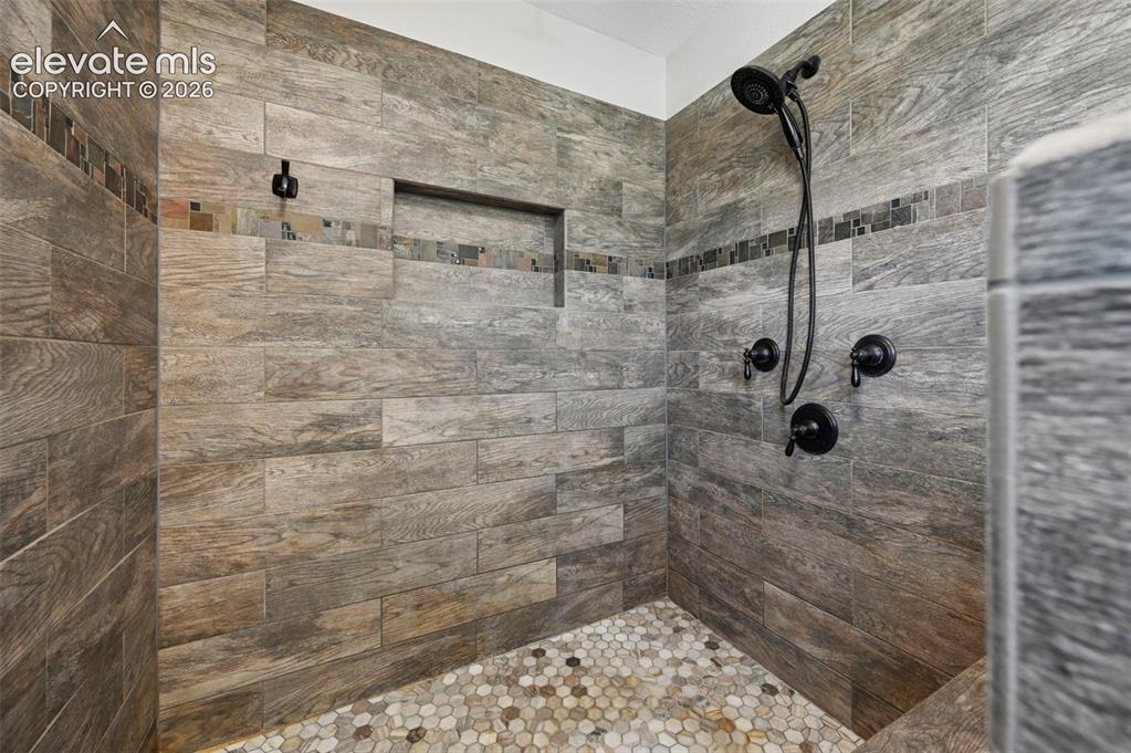 Image 24 of 50: Spa-Like Shower in Primary Bathroom