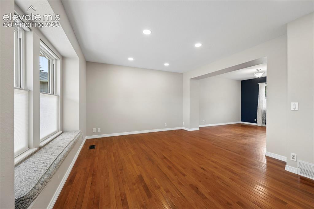 Image 3 of 50: Living Room with Wood Floors