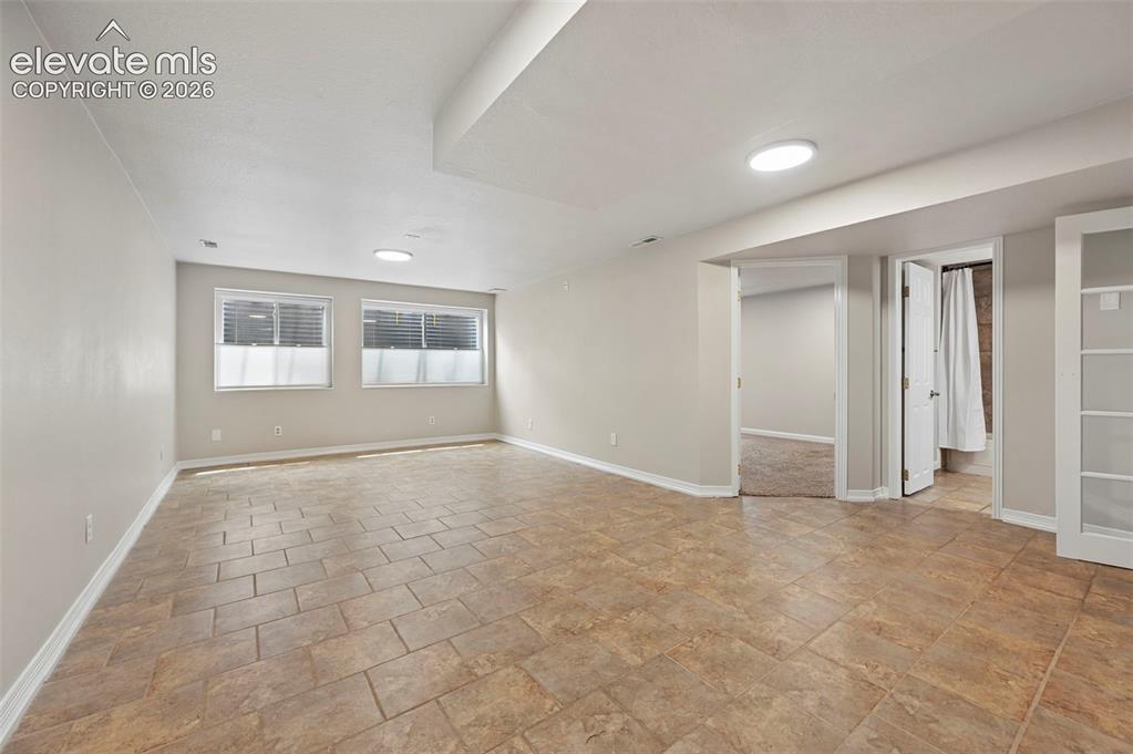 Image 34 of 50: Large Room in Basement