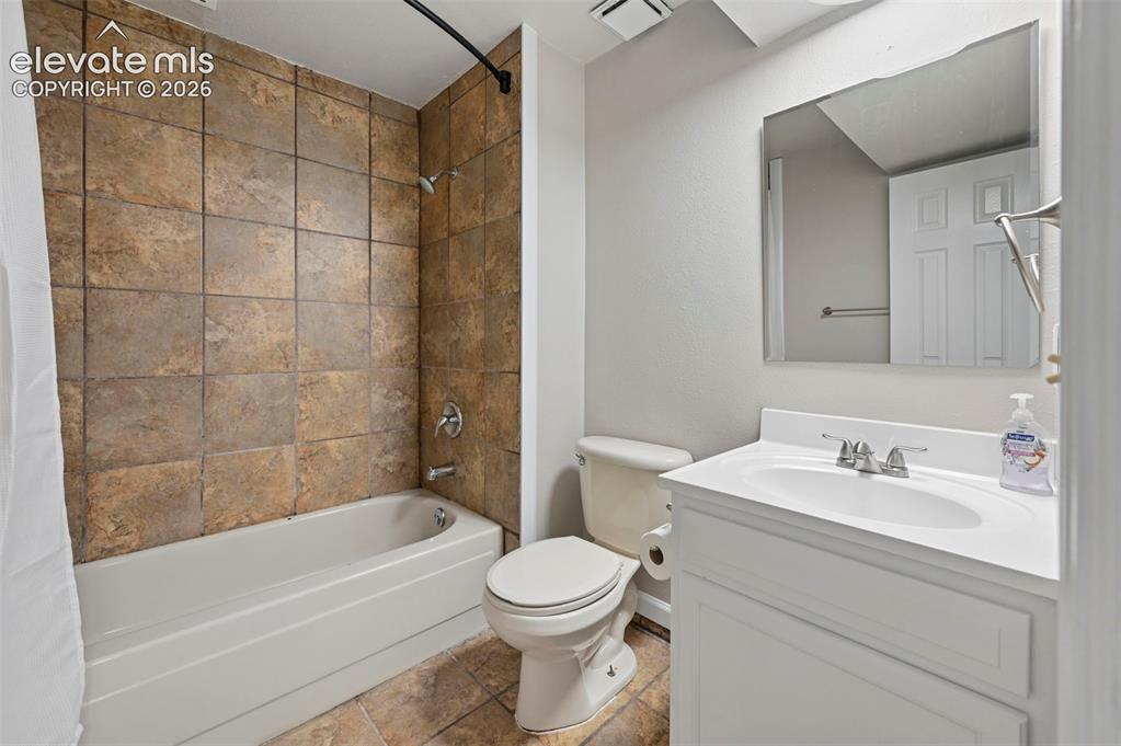 Image 36 of 50: Full Bathroom in Basement