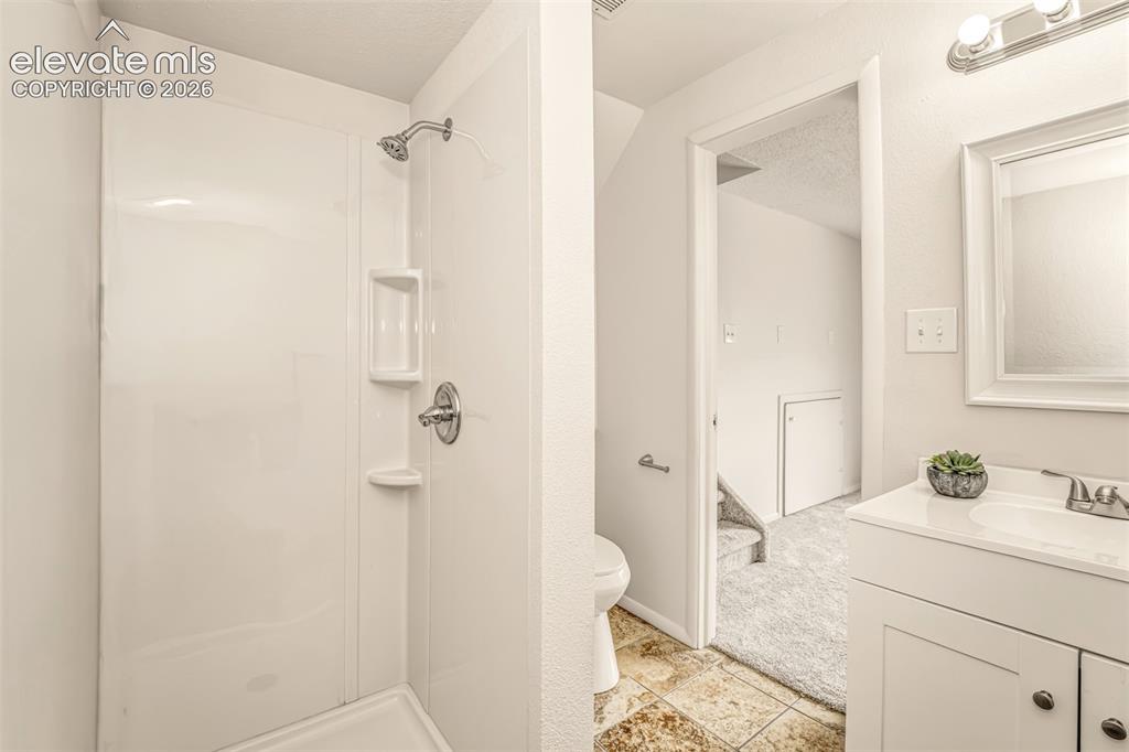Image 24 of 31: Lower Level Bath
