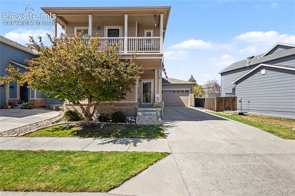 Image 1 of 41: Exterior Front with covered front porch