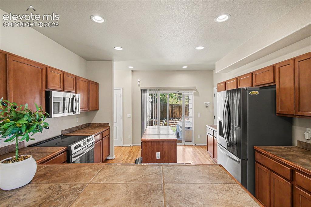 Image 13 of 41: Kitchen with dishwasher