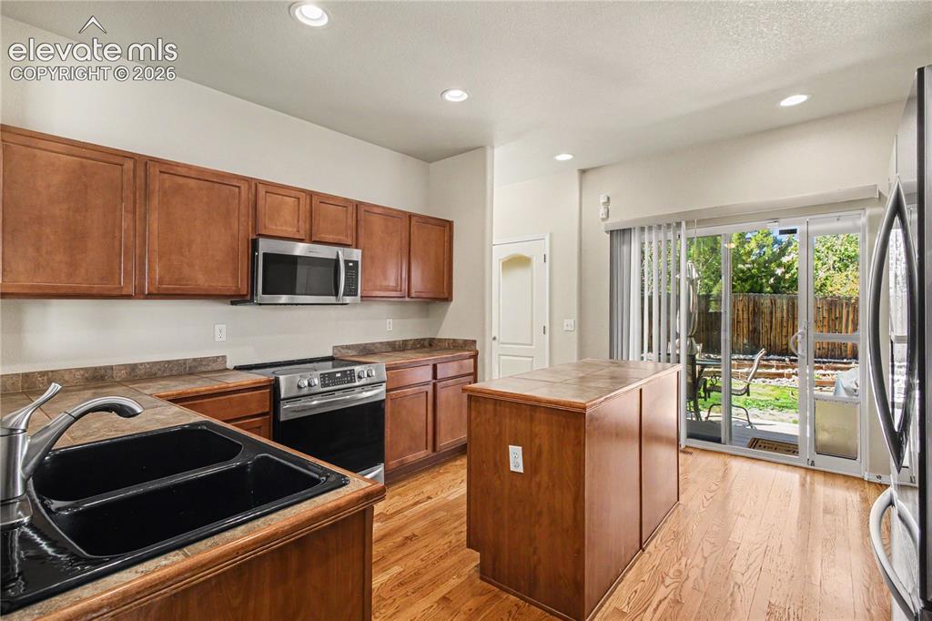 Image 14 of 41: Kitchen with new new stainless steel LG and Frigidaire