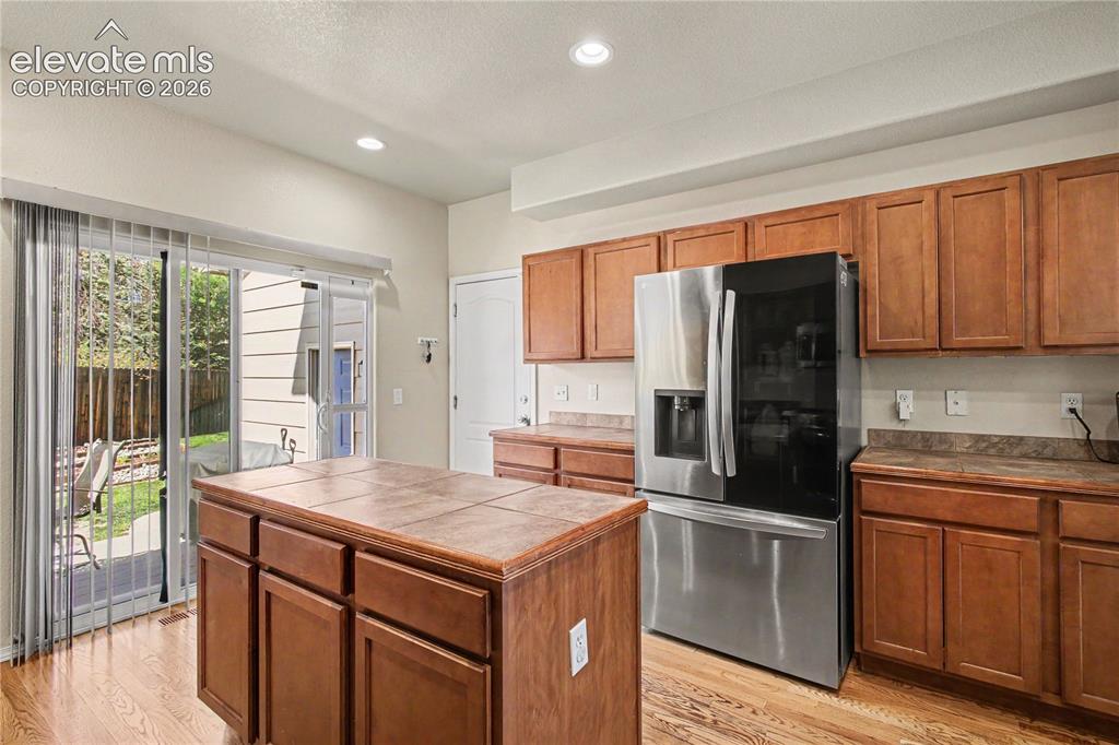 Image 15 of 41: Kitchen with stainless steel appliances
