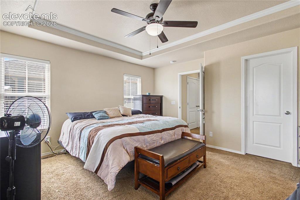 Image 17 of 41: Primary bedroom with walk-in closet