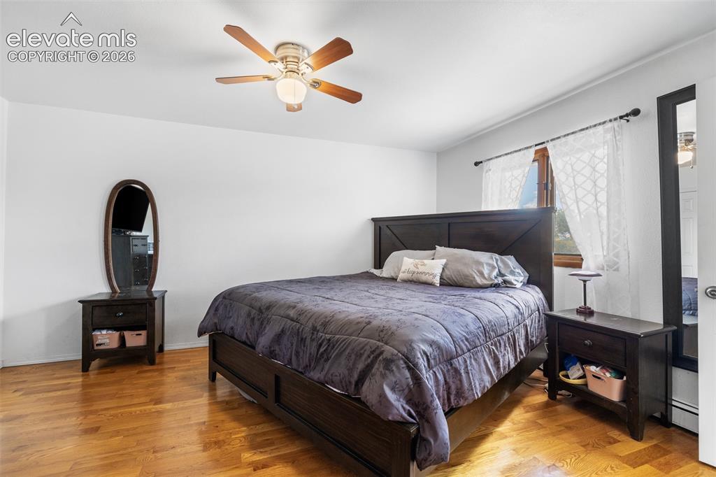 Image 13 of 41: Large primary bedroom with full bath and 2 closets
