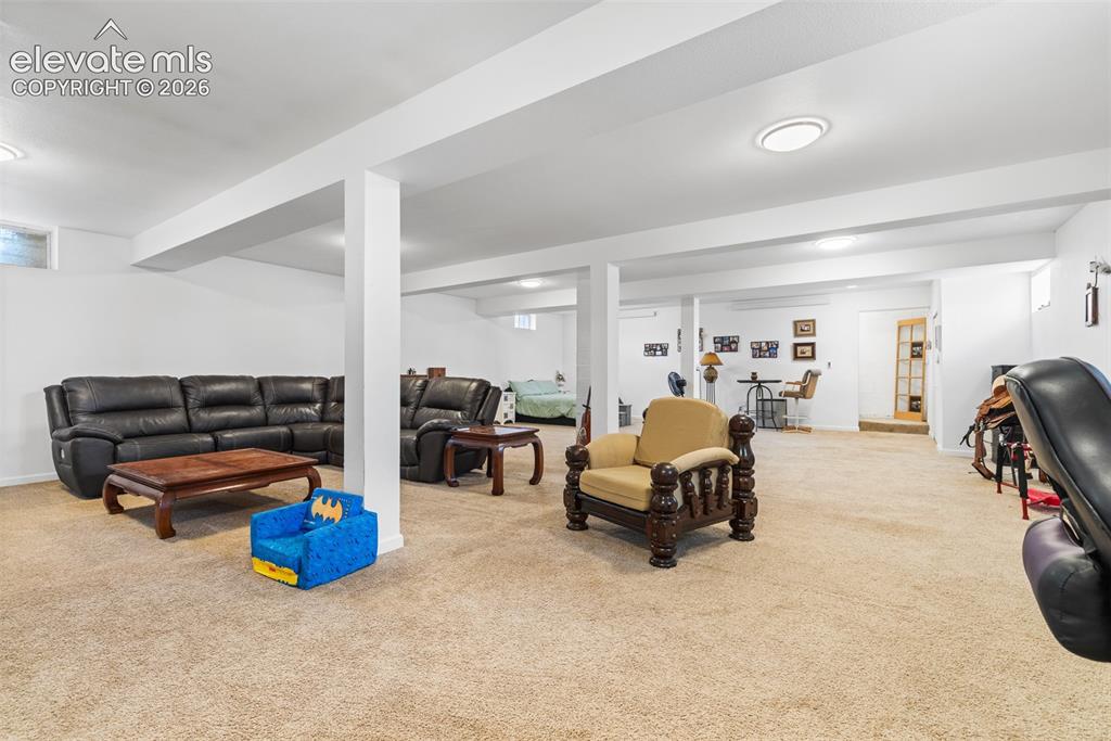Image 21 of 41: Full finished basement with mini splits