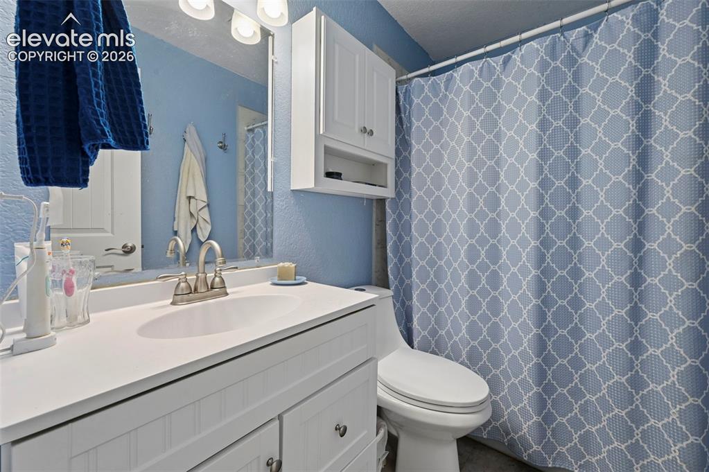 Image 14 of 33: Main level Full Bathroom