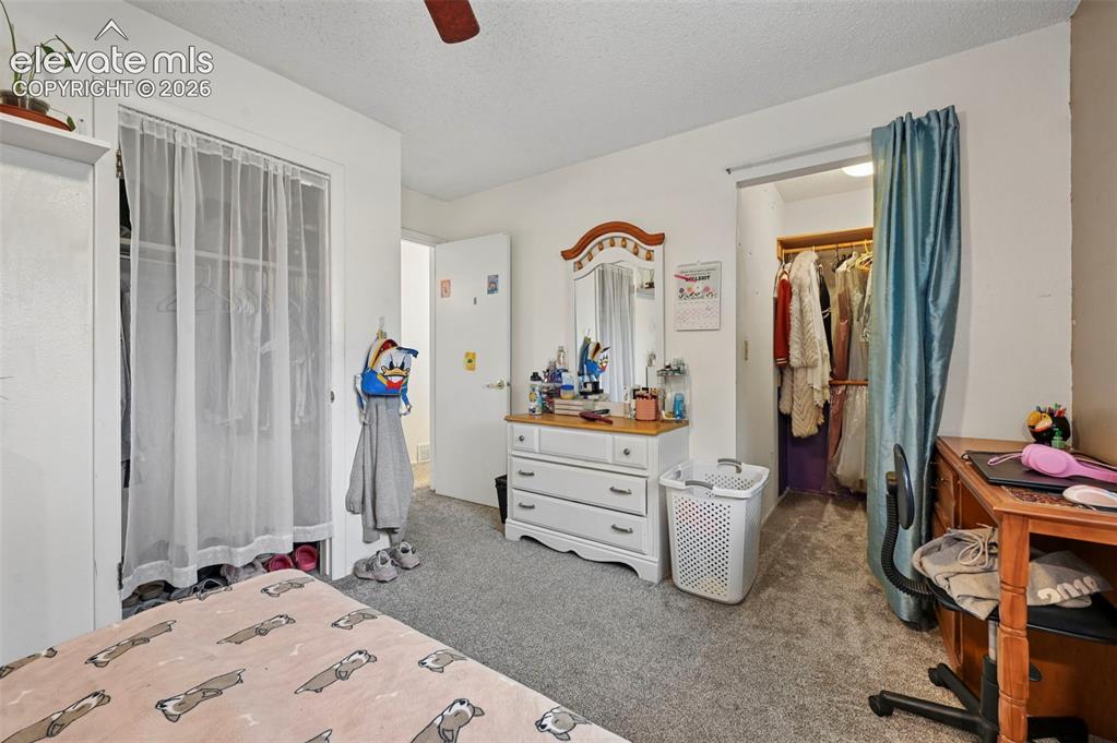 Image 17 of 33: Main level master bedroom with Walk in Closet