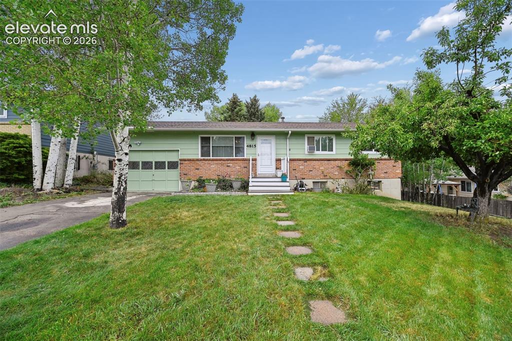 Image 2 of 33: Great front and Back Yard~