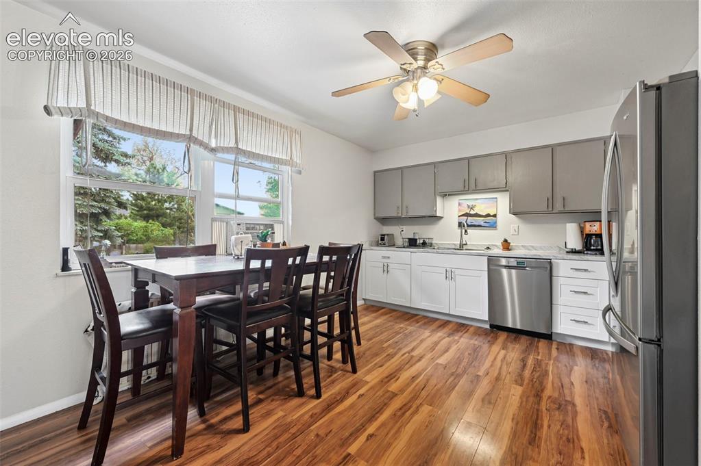 Image 8 of 33: Kitchen  and dining area.