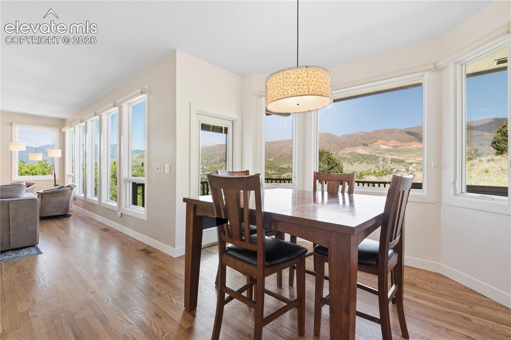 Image 17 of 50: Breakfast Nook with Walk-out Access to the Deck!
