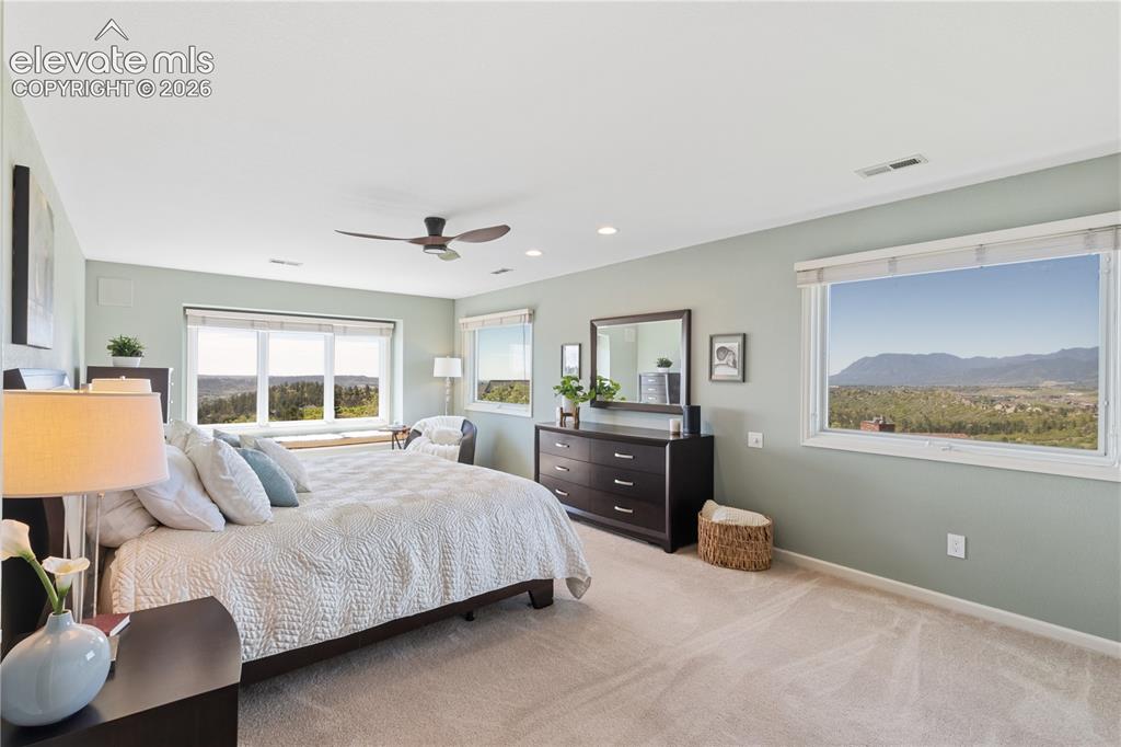 Image 25 of 50: Primary Suite Offers Incredible Mountain Views!