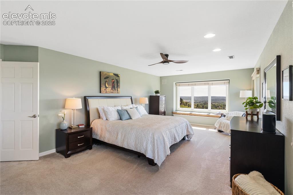 Image 28 of 50: Primary Suite Serves up a Generously Sized Walk-In Closet!