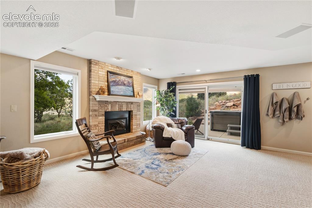 Image 38 of 50: Walk-Out Basement with Convenient Access to the Hot Tub!