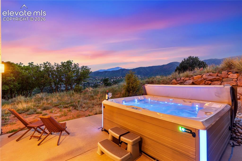Image 6 of 50: Enjoy Ending Each Day Soaking in the Hot Tub as the Sky Transforms with Vib