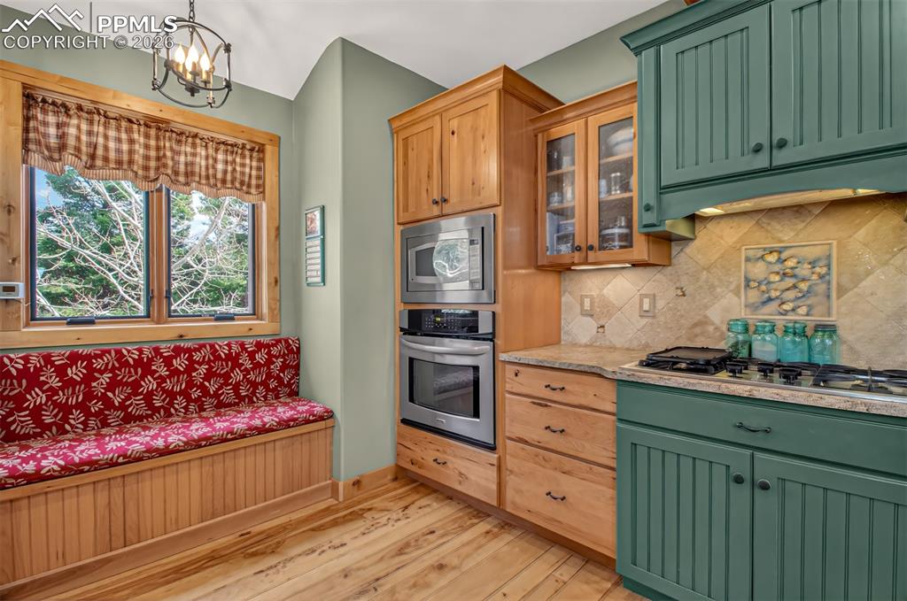 Image 16 of 48: Wrap around deck off dining room