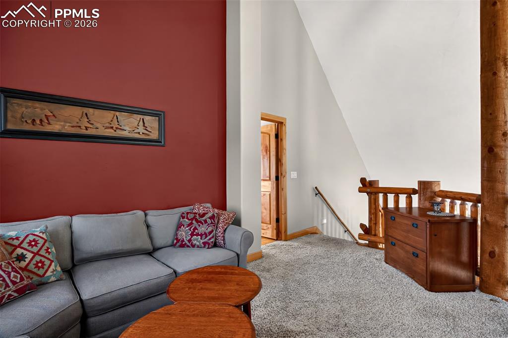 Image 33 of 48: 5 peice en suite primary bathroom with dual copper sinks surrounded by gran