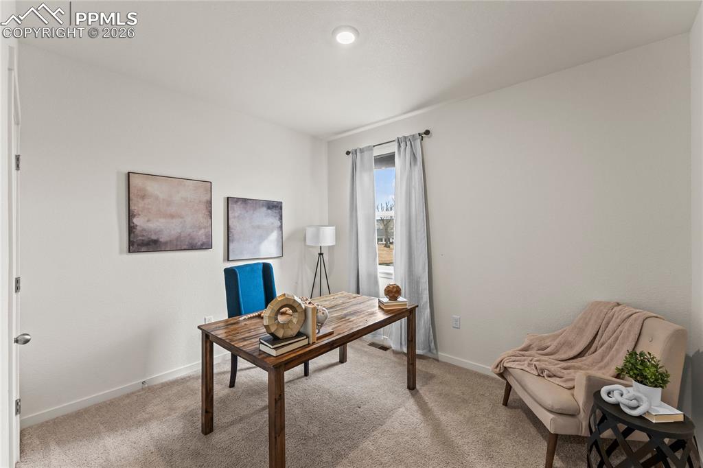 Image 18 of 49: main level bedroom