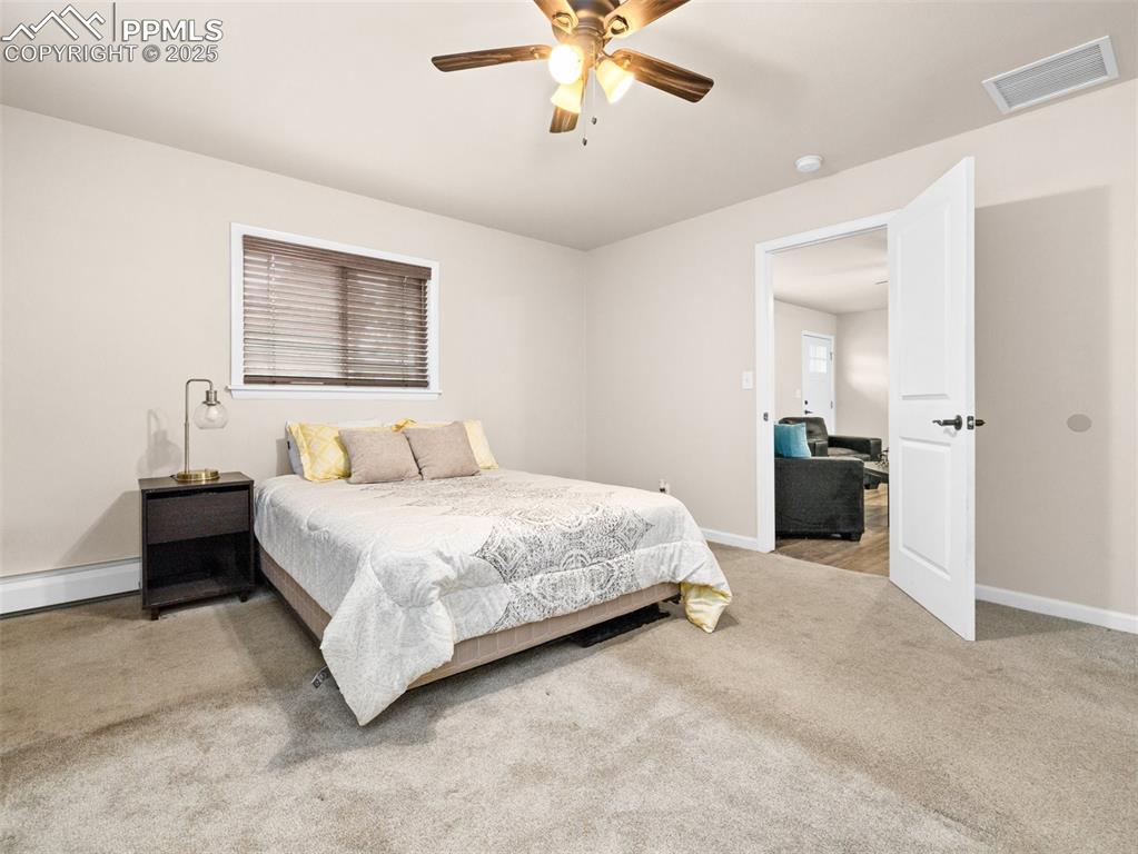 Image 13 of 21: Bedroom