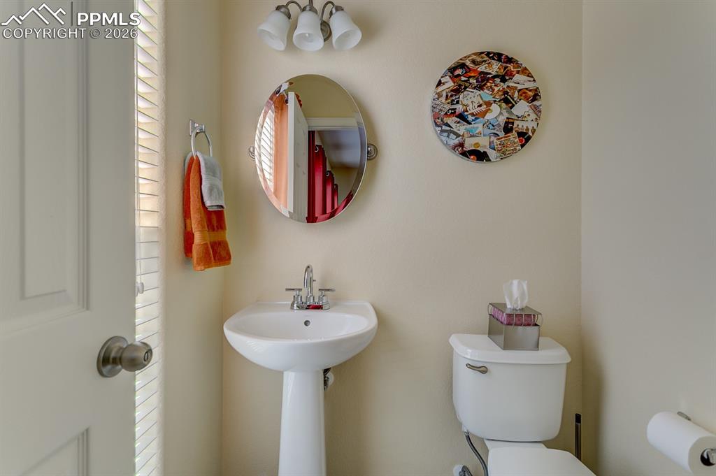 Image 15 of 28: Main Level 1/2 Bathroom