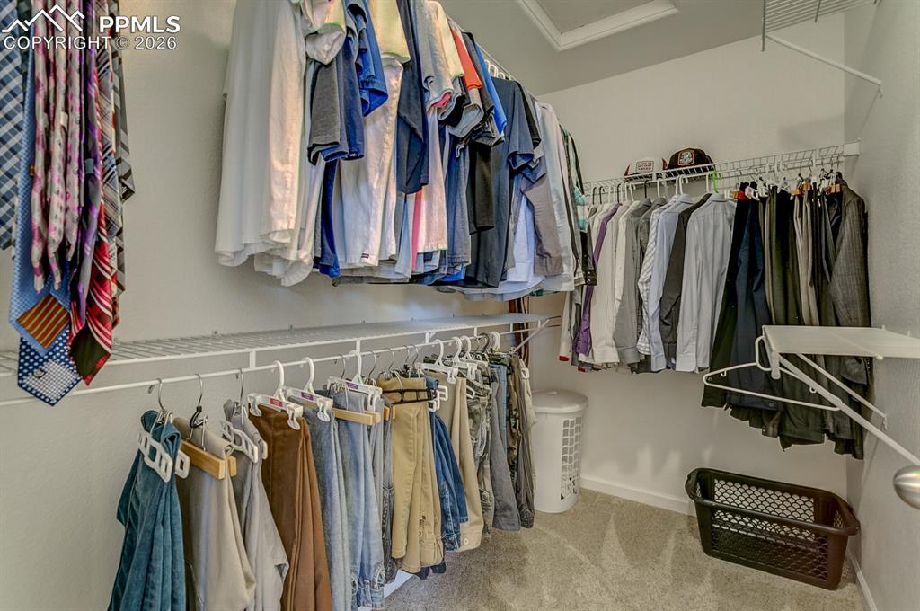 Image 18 of 28: Primary Bedroom Walk-In Closet