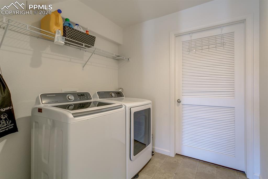 Image 22 of 28: Basement/Entry Way Laundry Location