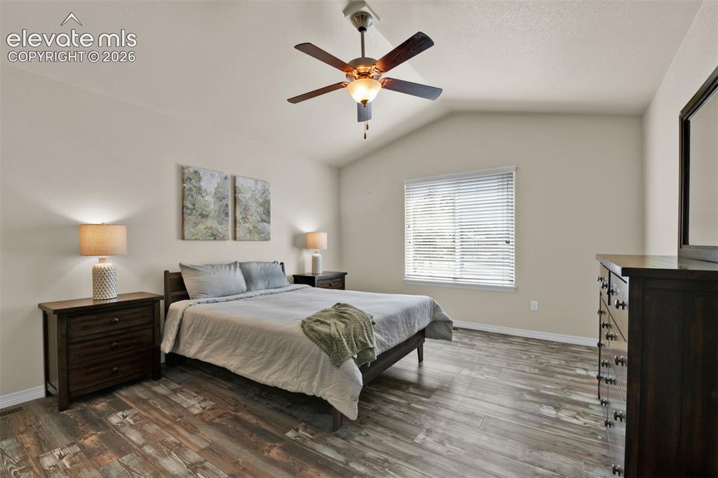 Image 12 of 32: Main level bedroom