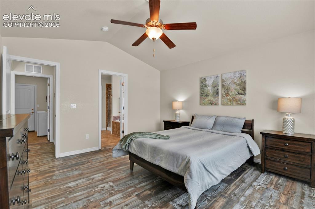 Image 13 of 32: Main level bedroom