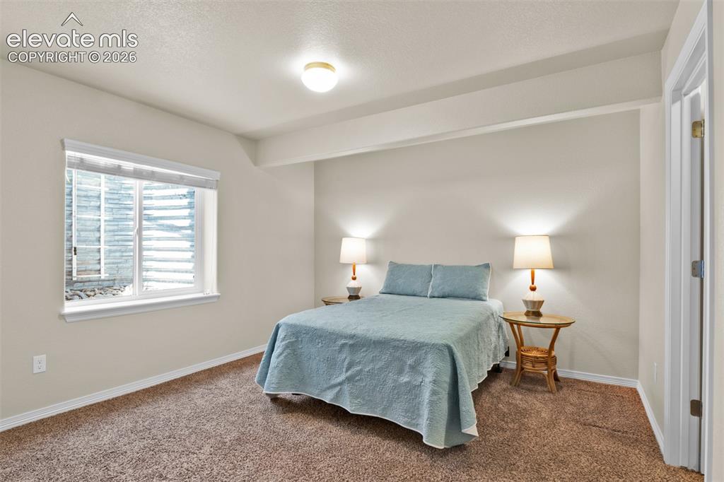 Image 25 of 32: Basement bedroom